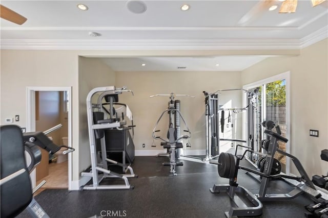 exercise room featuring crown molding