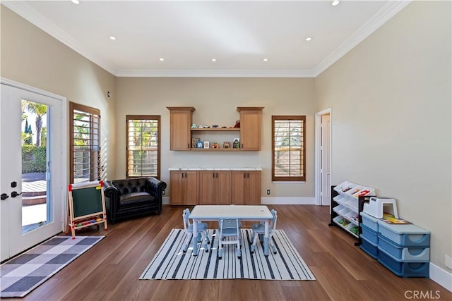 dining area with dark wood-type flooring, french doors, and plenty of natural light