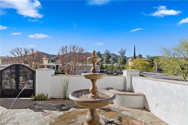 view of patio with a mountain view