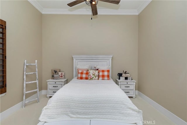 carpeted bedroom featuring ceiling fan and ornamental molding