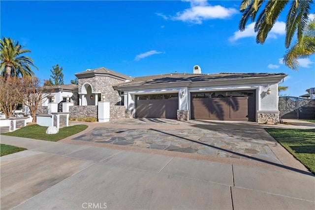 view of front of home featuring a garage