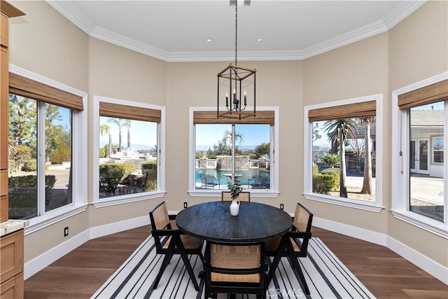 sunroom / solarium with an inviting chandelier and plenty of natural light