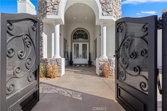 entrance to property featuring french doors