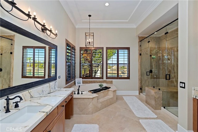 bathroom featuring crown molding, vanity, an inviting chandelier, and plus walk in shower