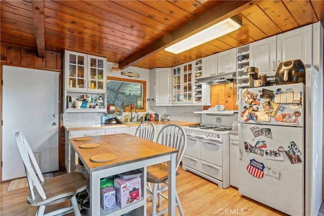 kitchen featuring white cabinetry, wood ceiling, white appliances, beam ceiling, and light hardwood / wood-style flooring