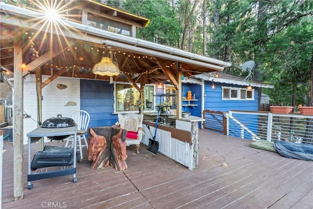 wooden deck with a gazebo