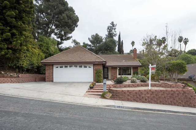 ranch-style home with a garage