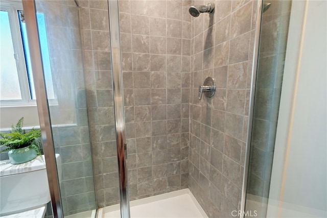 bathroom featuring walk in shower