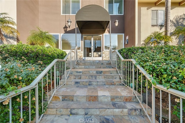 entrance to property featuring french doors