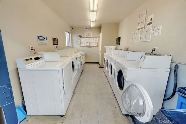 laundry room featuring separate washer and dryer