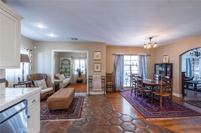 living room featuring an inviting chandelier