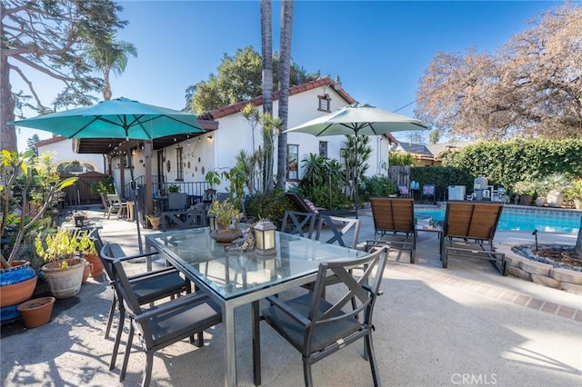 view of patio / terrace featuring a fenced in pool