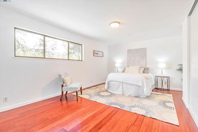 bedroom featuring hardwood / wood-style floors