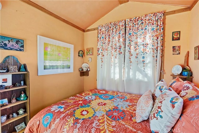 bedroom with vaulted ceiling