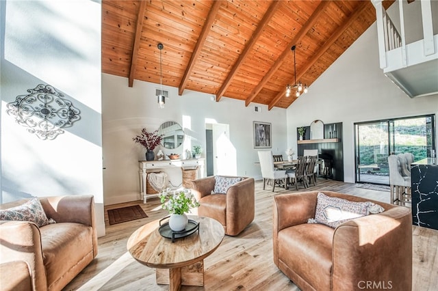 42893 Long Hollow Dr, Coarsegold, CA 93614 - living room with high vaulted ceiling, wood ceiling, light hardwood / wood-style flooring, and beamed ceiling