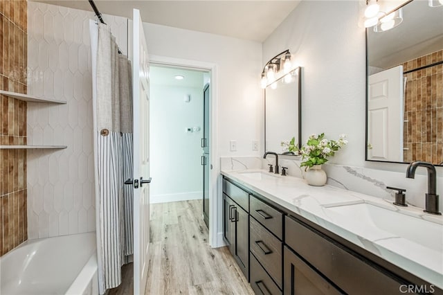 42893 Long Hollow Dr, Coarsegold, CA 93614 - bathroom featuring wood-type flooring, vanity, and shower / bath combo with shower curtain