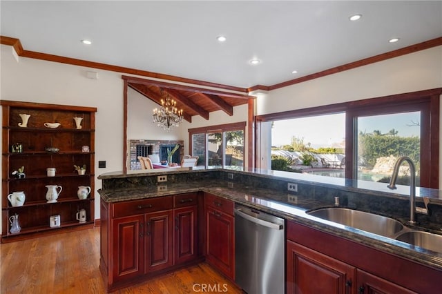 kitchen featuring a notable chandelier, stainless steel dishwasher, light wood-type flooring, and sink