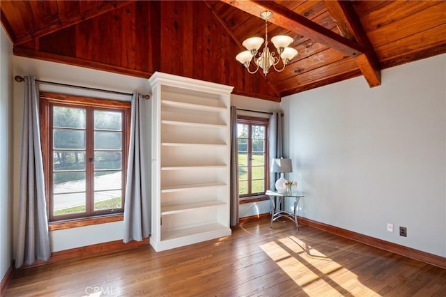 interior space featuring a chandelier, wood ceiling, wood-type flooring, and lofted ceiling with beams