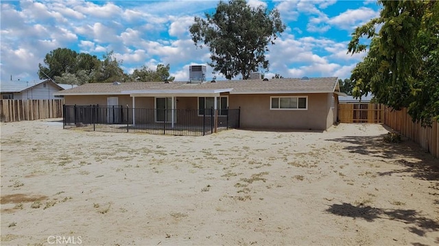 back of property with cooling unit