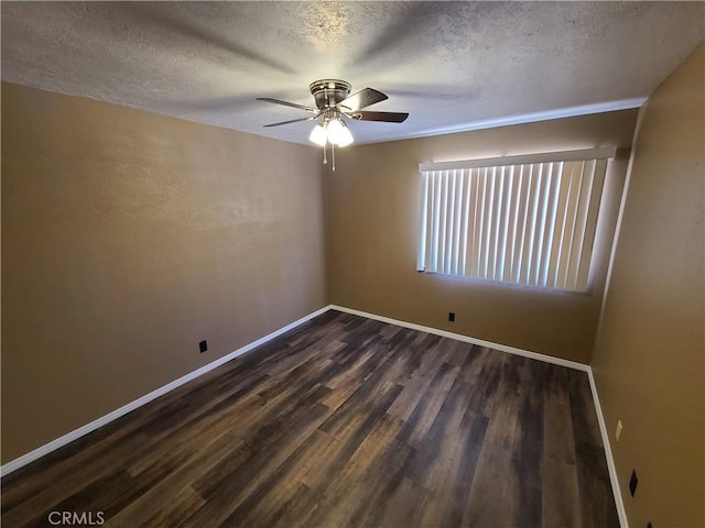 unfurnished room with a textured ceiling, ceiling fan, and dark hardwood / wood-style floors