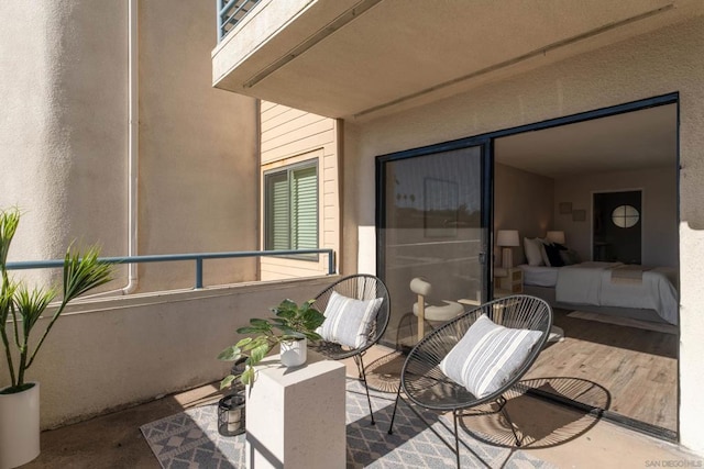 view of patio / terrace with a balcony