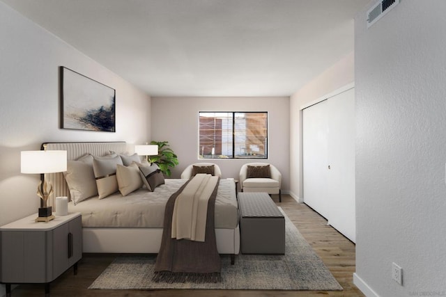 bedroom featuring dark hardwood / wood-style floors