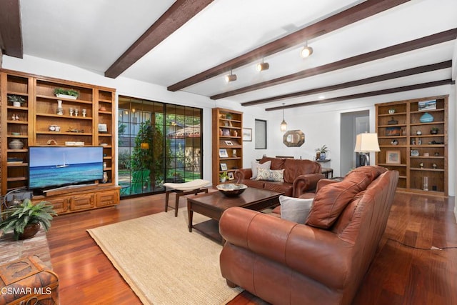 living room featuring dark hardwood / wood-style flooring and beamed ceiling