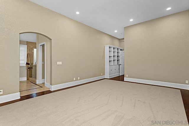 empty room featuring hardwood / wood-style floors