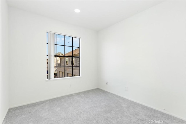 empty room featuring carpet flooring