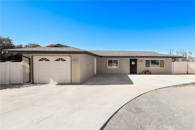 single story home with a garage