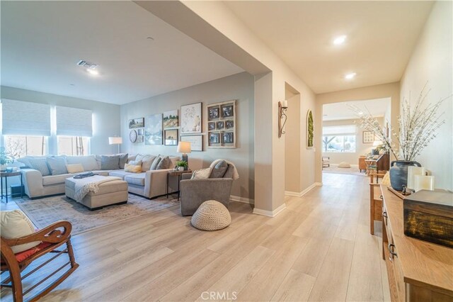 living room with light hardwood / wood-style floors