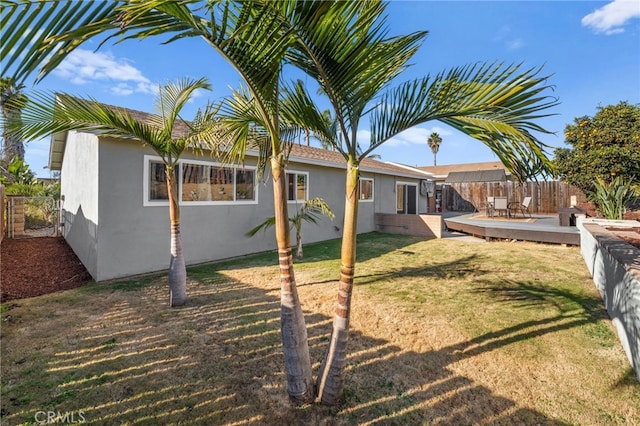 view of yard featuring a deck