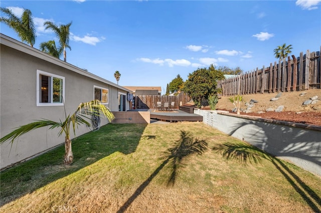 view of yard featuring a deck