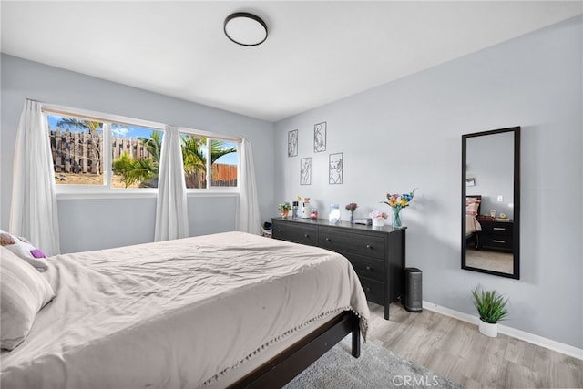 bedroom featuring light hardwood / wood-style floors