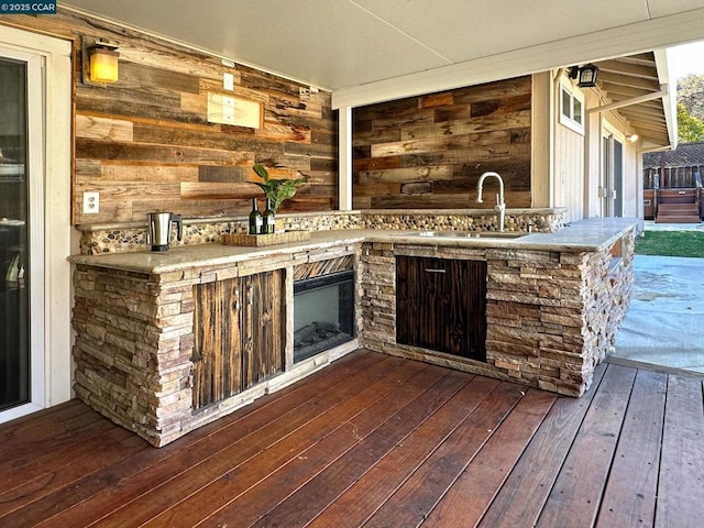 deck with an outdoor wet bar