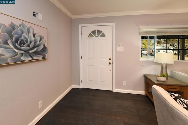 entrance foyer with dark hardwood / wood-style flooring and ornamental molding