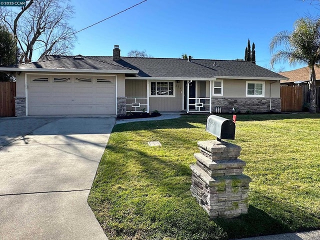 single story home featuring a front yard and a garage