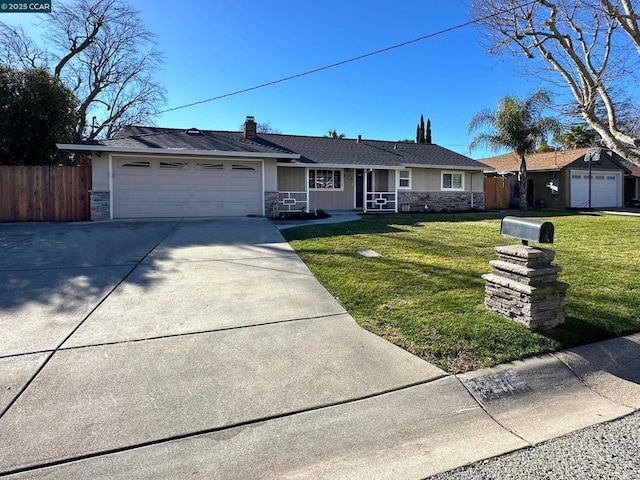 ranch-style house with a front yard and a garage