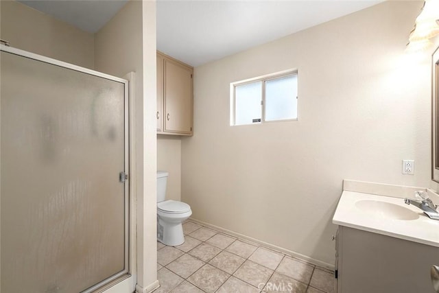 bathroom with a shower with shower door, tile patterned floors, toilet, and vanity