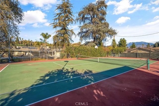 view of sport court featuring basketball court