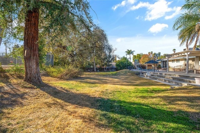 view of yard with a pergola