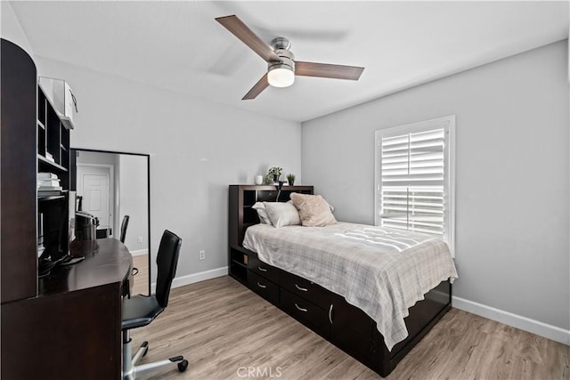 bedroom featuring ceiling fan and light hardwood / wood-style floors