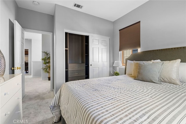 bedroom featuring light colored carpet