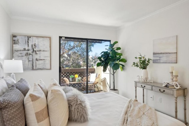 bedroom featuring access to outside and ornamental molding