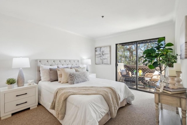 carpeted bedroom featuring crown molding and access to outside