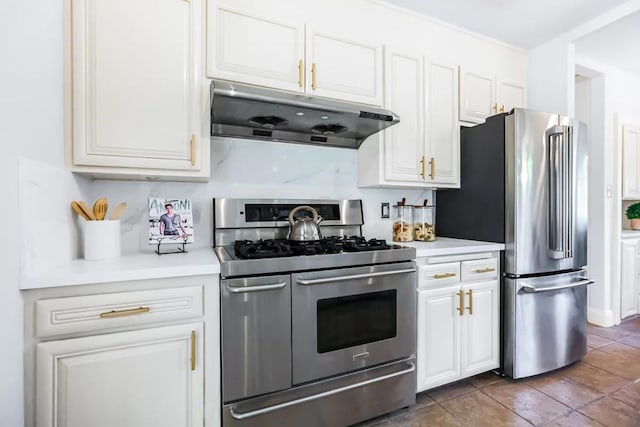 kitchen with white cabinets and appliances with stainless steel finishes