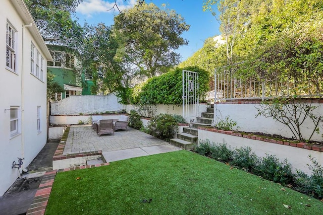 view of yard with a patio area