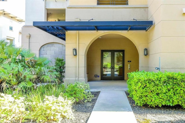 doorway to property with french doors