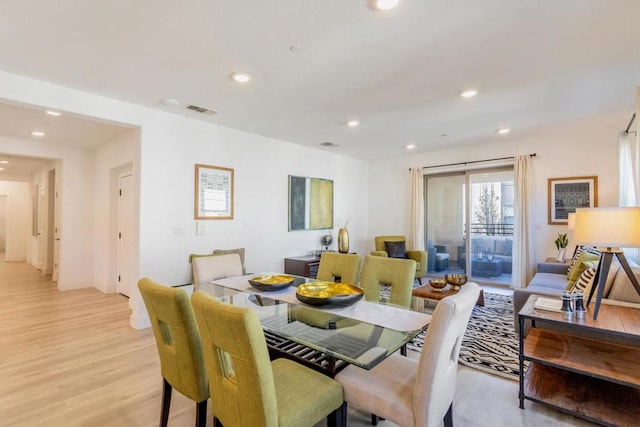 dining room featuring light wood-type flooring