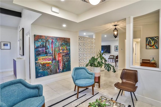 sitting room with light tile patterned flooring